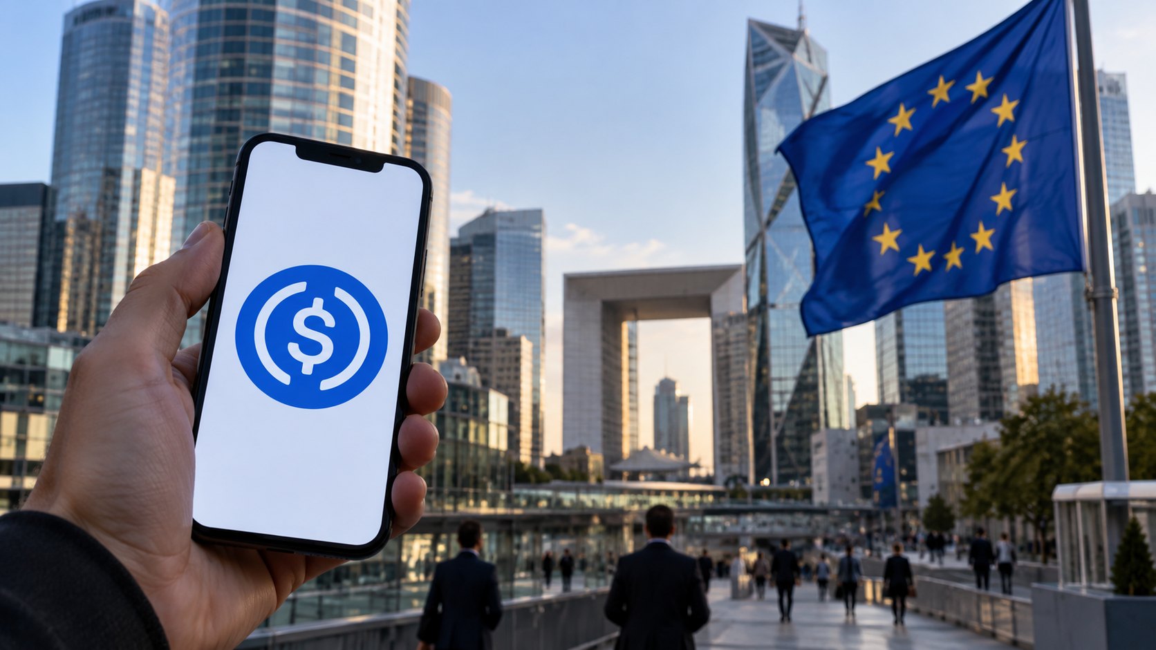 Ilustración editorial generada con IA: en primer plano, una mano sostiene un teléfono que muestra el logotipo de USDC; detrás, las torres de vidrio y el Grande Arche del distrito de La Défense, en París, donde tiene su sede la Autoridad Bancaria Europea, y una bandera de la Unión Europea; composición conceptual, no es una fotografía del anuncio.